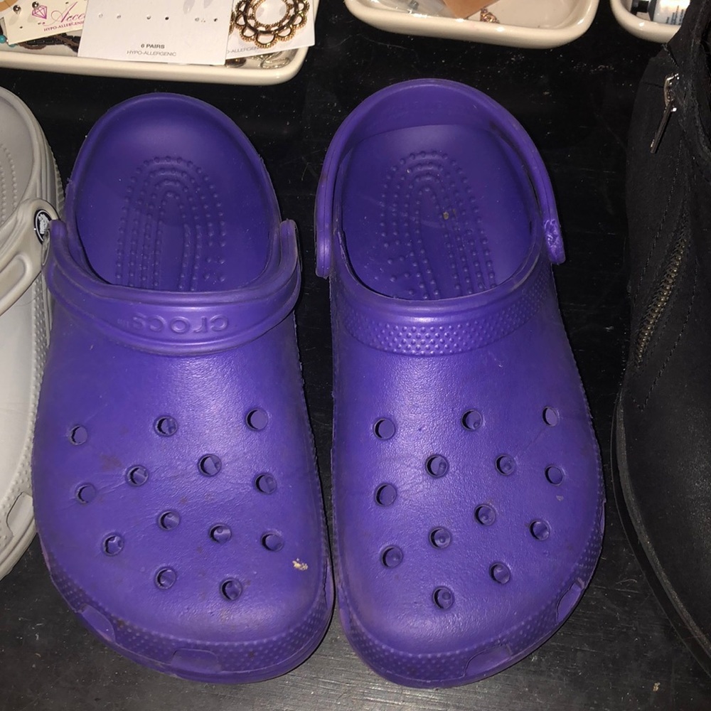 purple crocs and/or black boots